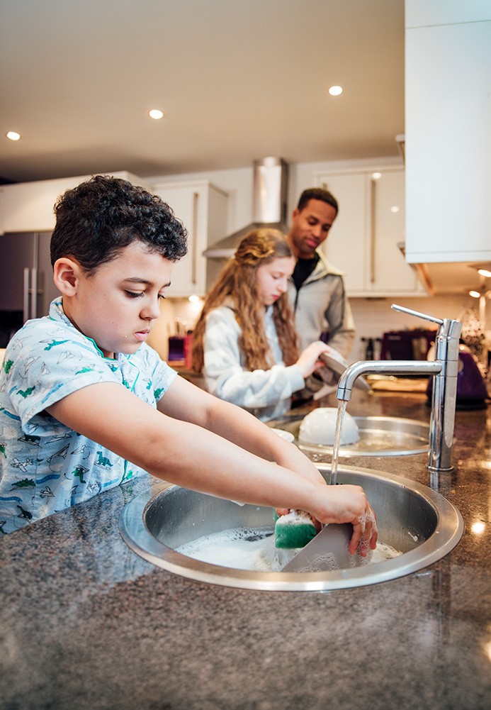 Family Washing Dishes